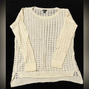 Women’s cream sweater with holes. Size small.